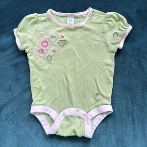 Baby Gap Girls embroidered onesie green with pink trim.